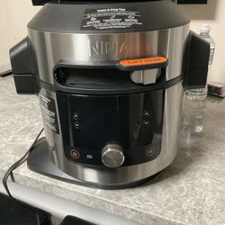 Ninja OL601 Foodi XL 8 Qt. Pressure Cooker Steam Fryer with SmartLid, 14-in-1 that Air Fries, Bakes & More, with 3-Layer Capacity, 5 Qt. Crisp Basket 