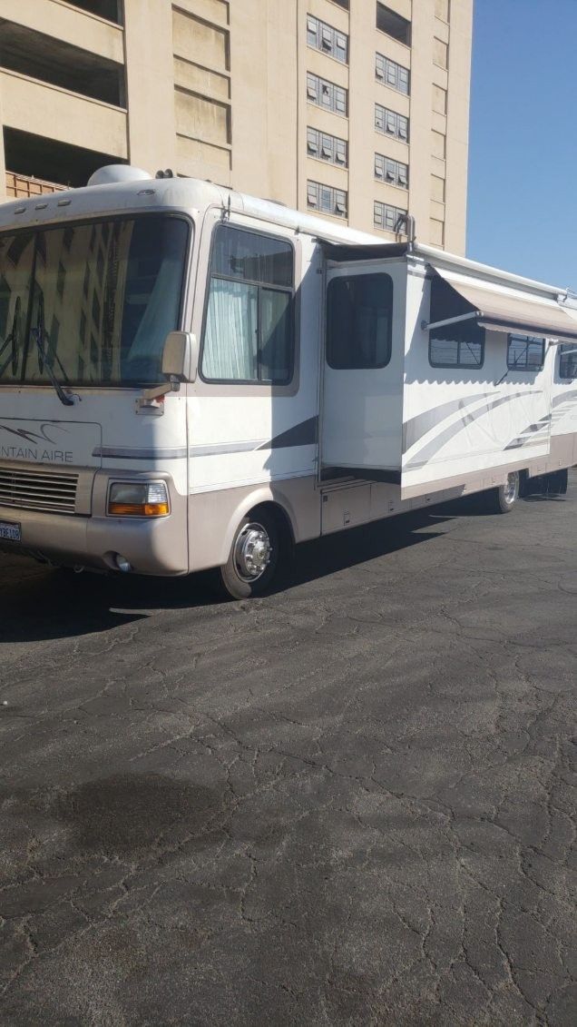 Rv 1999 Monutain Aire Low Miles .. Need To Sale It Asap