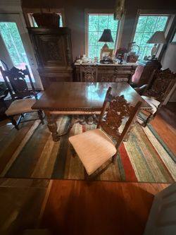 Antique Dining table with 12 chairs hand carved wood work