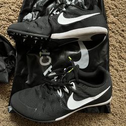 Black Nike track shoes