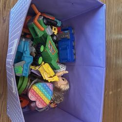 Soft sided toy box with toys