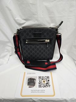 Authrntic Entrupy Certified Gucci GG Black Small Messenger Bag crafted from black GG Supreme canvas.