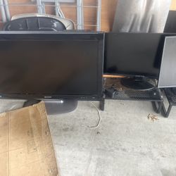 Vizio Tv And Two Sceptre Monitors 