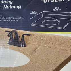 31 inch vanity top new the color is nutmeg. located in Henderson.