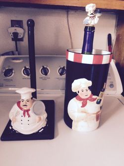 Napkin holder n wine bottle holder n wine top.