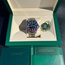 Rolex GMT Master 40mm II 116710 diamonds rubies sapphires set stainless steel watch