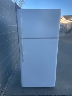 Kenmore top and bottom refrigerator for $180. Dimensions are 30Wx30Dx66H. Pick up only.