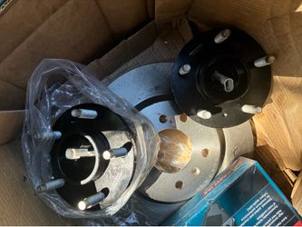 Hub bearing rotors and brake pads