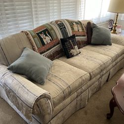 Couch And Cherry Wood Tables