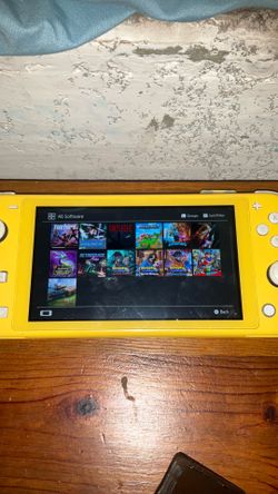 Nintendo switch light, five games, Minecraft legends shopping, clutter Pokémon violet super Mario, Odyssey and Minecraft