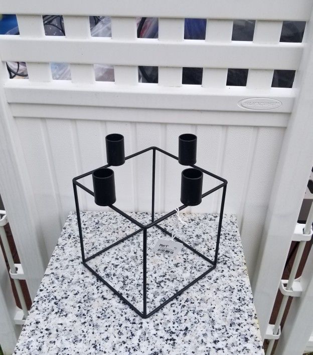 Black metal candle holder