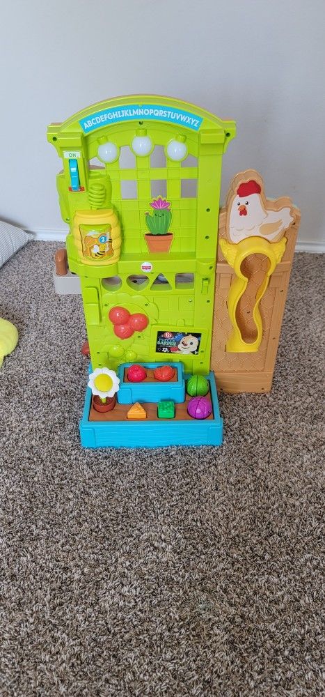 Fisher Price Laugh & Learn Garden To Kitchen Playset.
