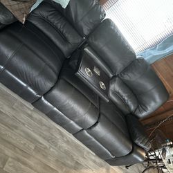 Sofa Has Two  Recliners On Each Side 