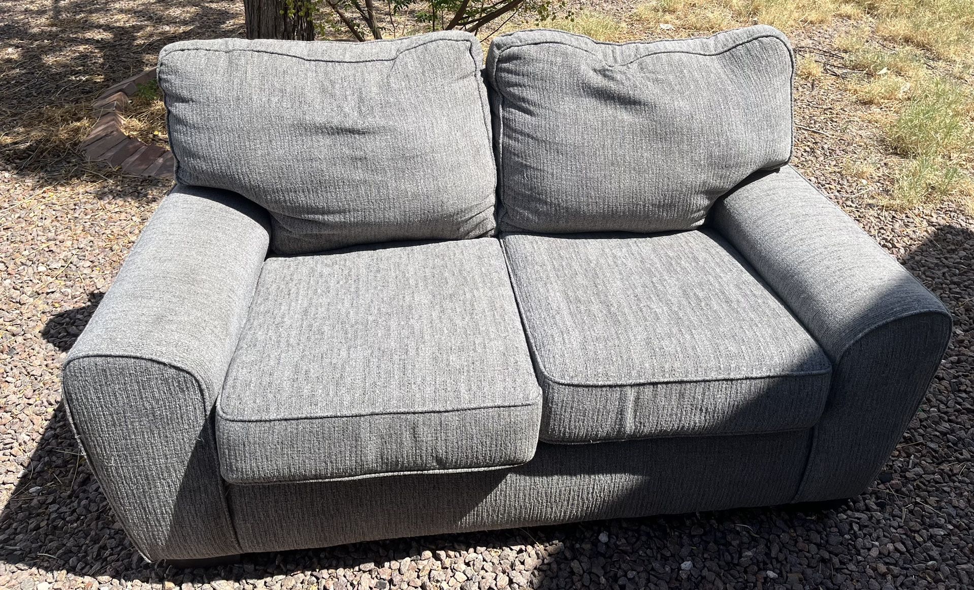  grey fabric love seat