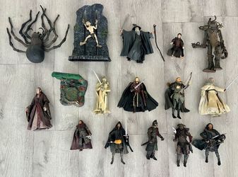 This is a collection of vintage Toy Biz The Lord of the Rings action figures and accessories