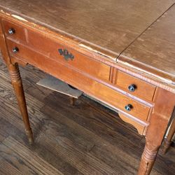 Singer model 500a sewing machine and cabinet 