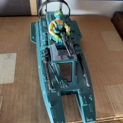 1984 G.I. Joe Cobra Water Moccasin vehicle with its pilot, Copperhead