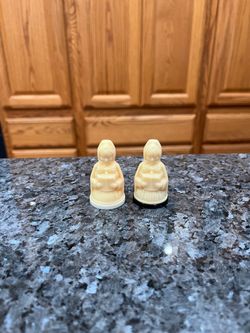 Vintage Victoria Mini Plastic Christmas Carolers pair of Salt and Pepper Shakers. Size approximately 2 inches tall.  Preowned.