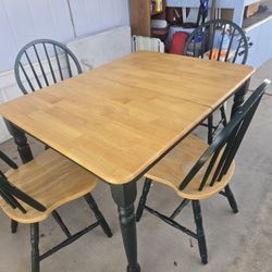Dining room table with 4 chairs.