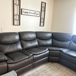 Triple Recliner Sectional With Storage And Charging Port