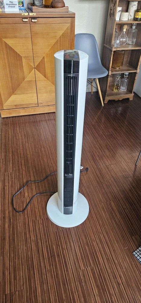 Lasko 1500 Watt 4 Speed Quiet Bladeless Multi Function Remote Control Comfort Control Tower Fan and Space Heater with 3 Heat Settings, White