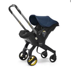 Doona Infant Car Seat Stroller with Base