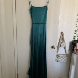 Emerald green open back prom dress