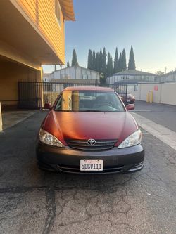 Toyota Camry LE 2005 (red)