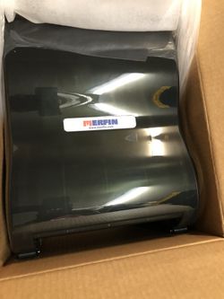 Merfin no touch paper towel dispenser.