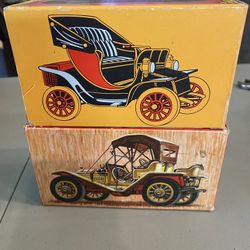 2 collectible Avon bottles with boxes. Electric Charger & Packard Roadster - Automobile. Boxes have some wear as shown