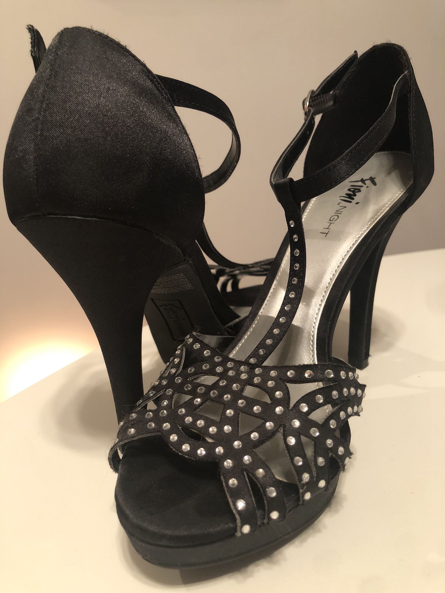 Black high heels with rhinestones