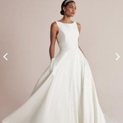 A gorgeous wedding dress brand you never use before.