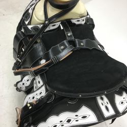 Montura charra de cuero con cantinas desmontables
