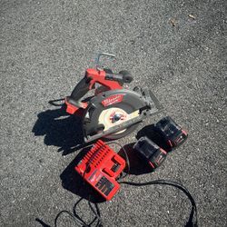 Milwaukee Skillsaw And Batteries  