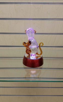 Glass Monkey Figurine with LED lights ( NEW ) $9.99. Round mirror base. Batteries included