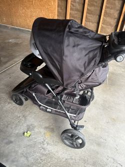 Black And Grey Baby Trend Stroller & Car Seat