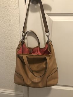 Tan Coach purse