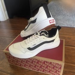 New White/black Vans 