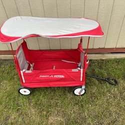RADIÓ  FLYER 3 IN 1 EZ FOLD WAGON WITH CANOPY IN GOOD CONDITION 