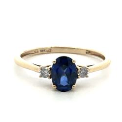 Woman’s Ladies 10k Yellow Gold Oval Blue Stone with Diamond Accents Ring Size 7 GP3128914