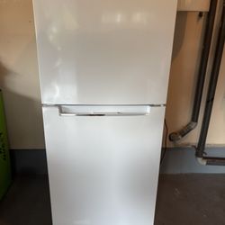 Small Fridge Width 23 1/2.  Long 57 1/2 