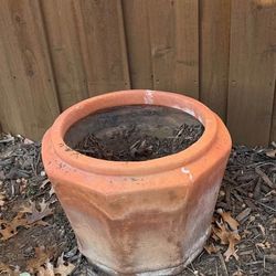 Sturdy large Terracotta/ iron planter, perfect for garden use.