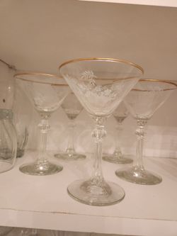 Five gold trimmed flower etched martini glasses