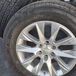 Chevy LTZ OEM 20s Wheels On Bridgestone Tires.