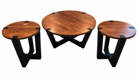Round walnut coffee table with X base