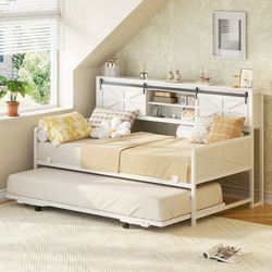 Twin size day bed with bed underneath converts to king size