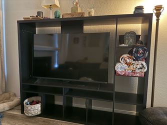 Entertainment stand with shelves