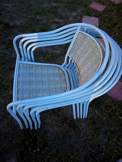 5 light blue chairs