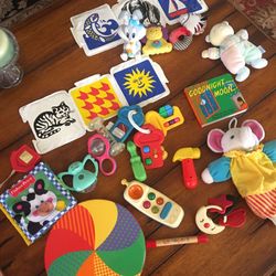 Large Group of Baby Toys Books and Rattles