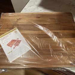 Brand new Acacia Wood cutting board 
